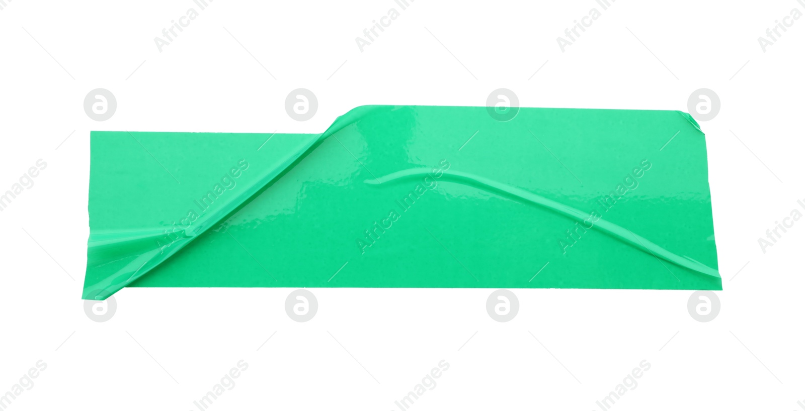 Photo of Strip of green adhesive tape isolated on white, top view