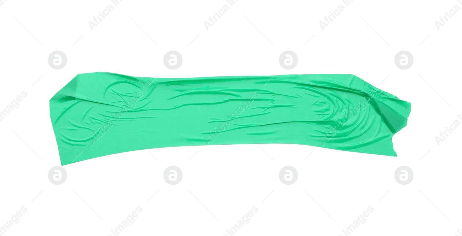 Photo of Strip of green adhesive tape isolated on white, top view