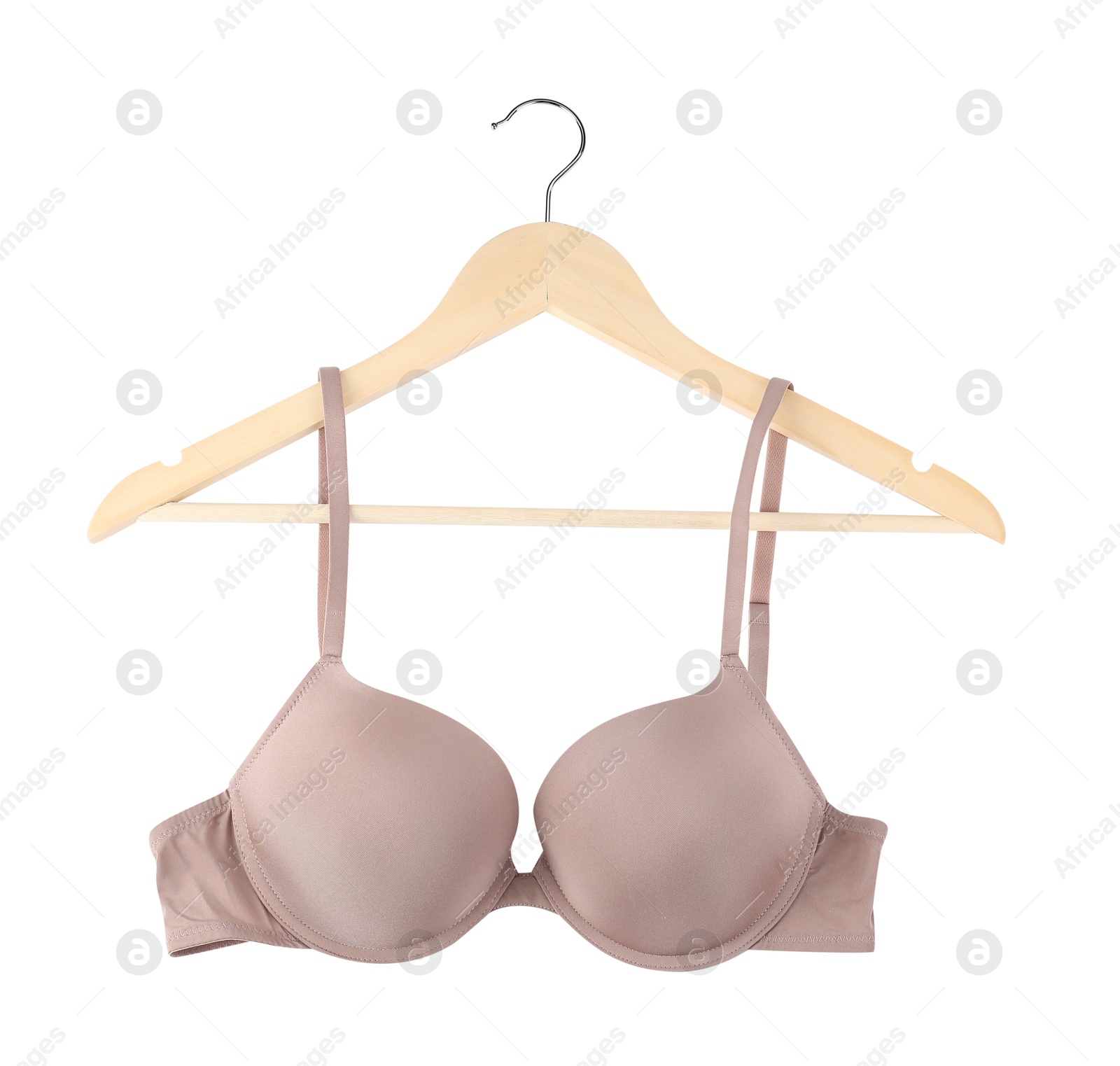 Photo of Beautiful beige bra on hanger against white background