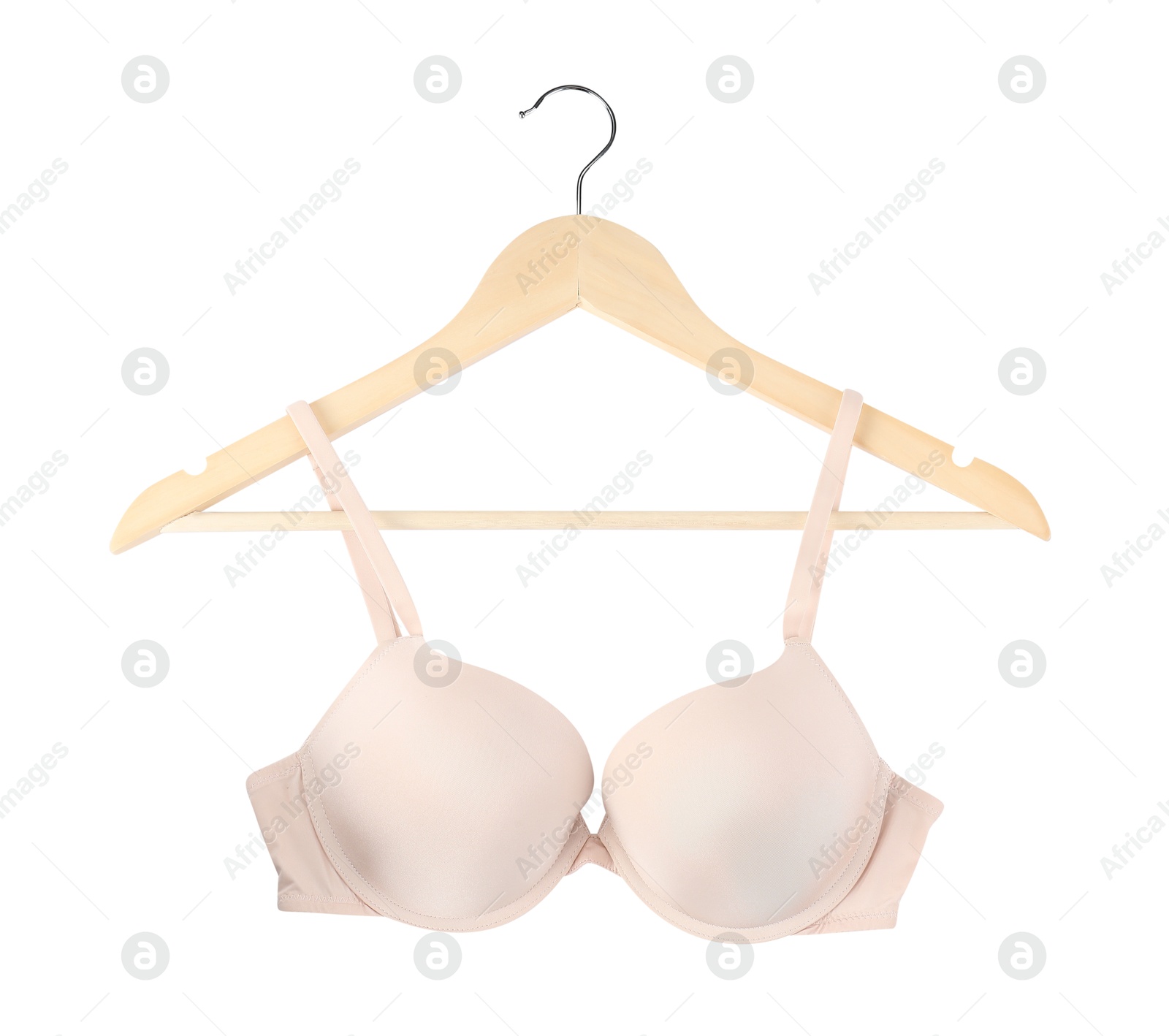 Photo of Beautiful beige bra on hanger against white background