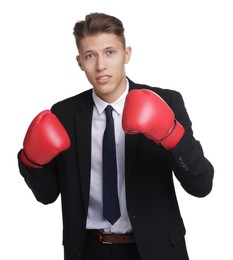 Photo of Competition. Businessman in suit wearing boxing gloves on white background