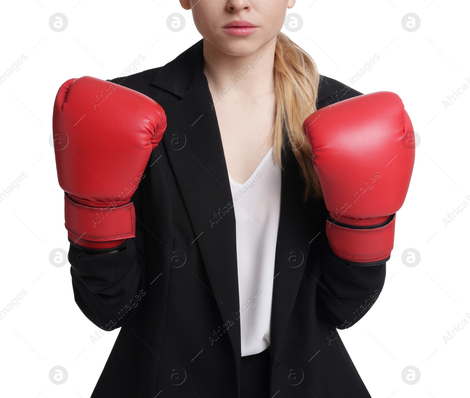 Photo of Competition. Businesswoman in suit wearing boxing gloves on white background, closeup