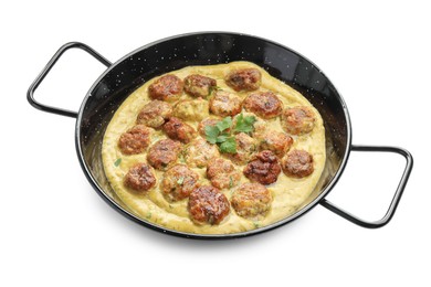 Photo of Delicious meatballs with gravy cream sauce and herbs isolated on white