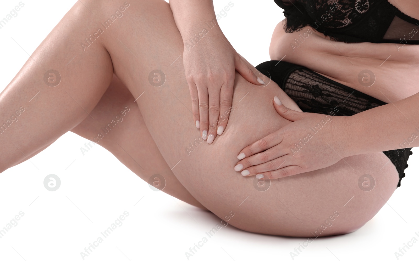 Photo of Woman in underwear on white background, closeup. Cellulite problem