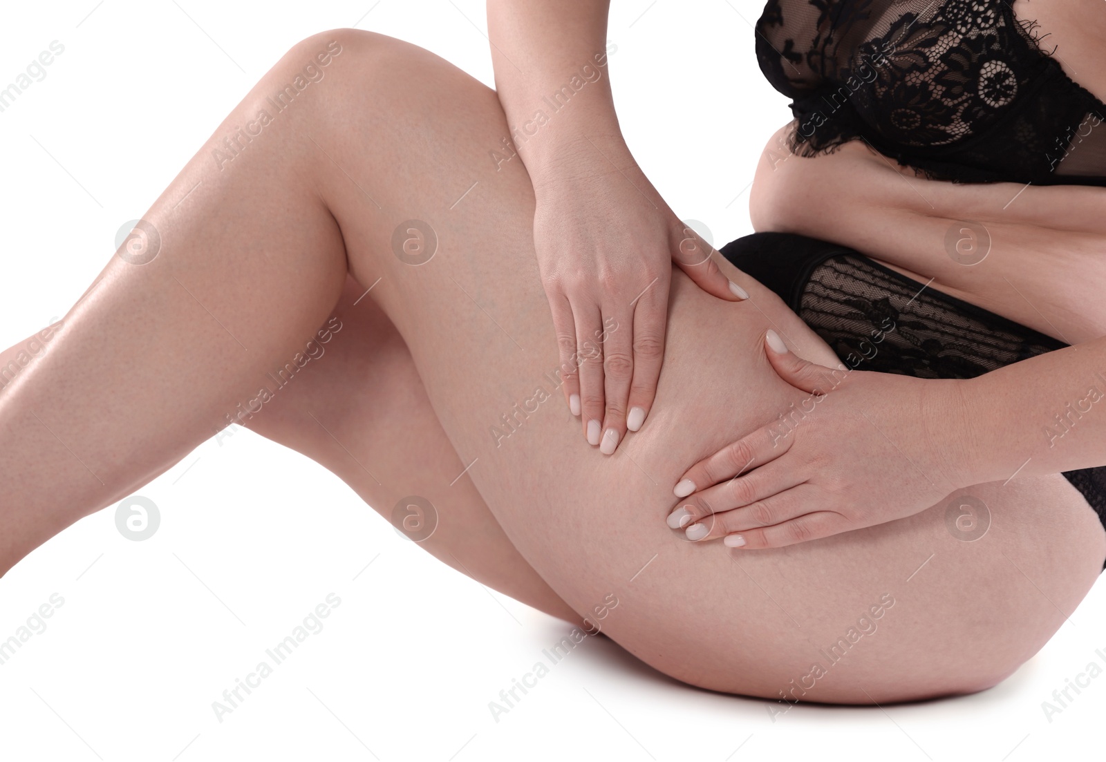 Photo of Woman in underwear on white background, closeup. Cellulite problem