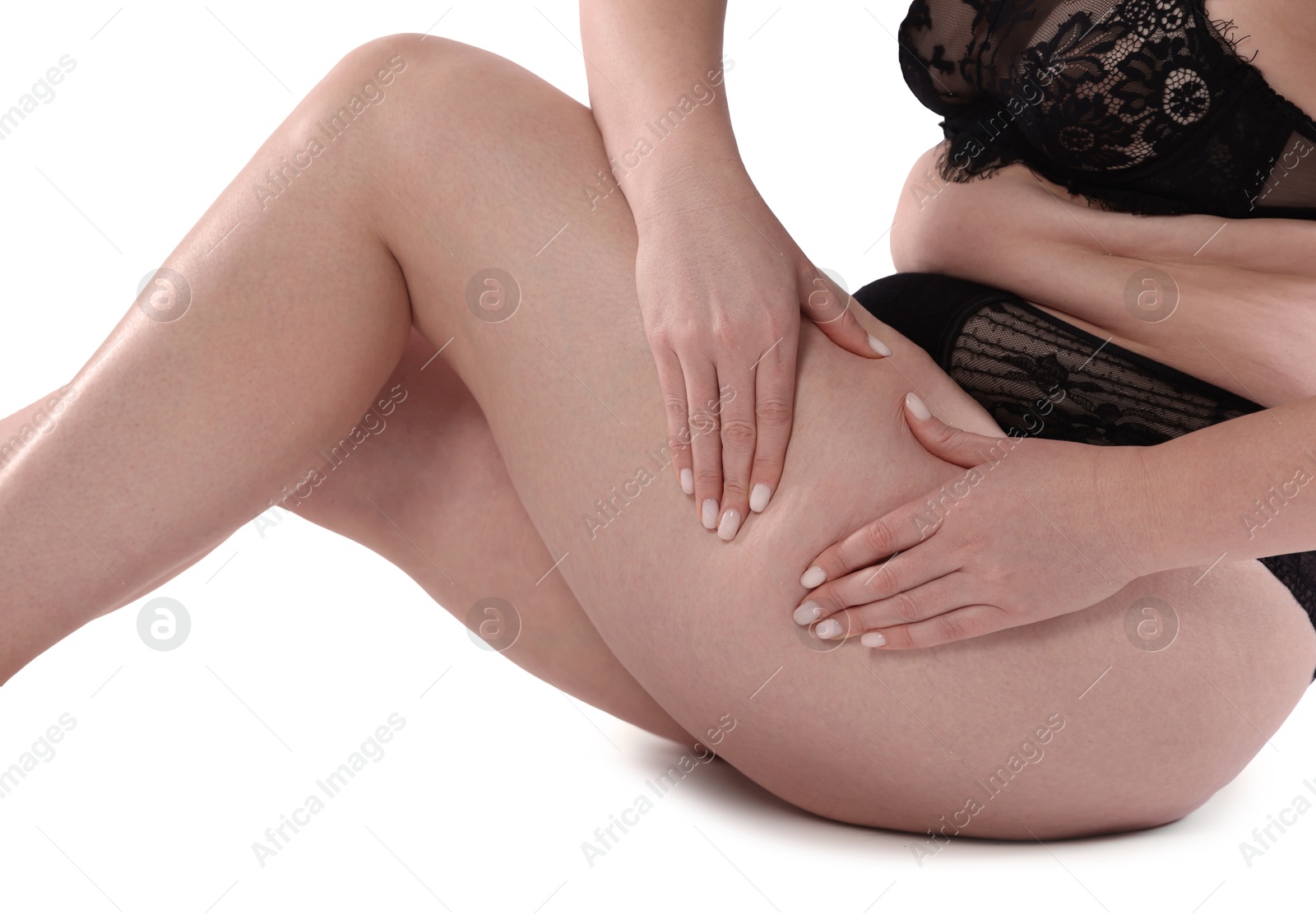 Photo of Woman in underwear on white background, closeup. Cellulite problem