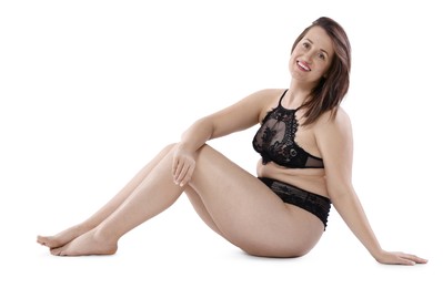 Woman in underwear on white background. Cellulite problem