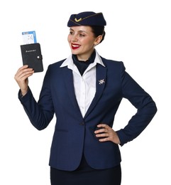 Photo of Happy stewardess holding passport with flight ticket on white background