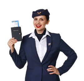 Photo of Happy stewardess holding passport with flight ticket on white background