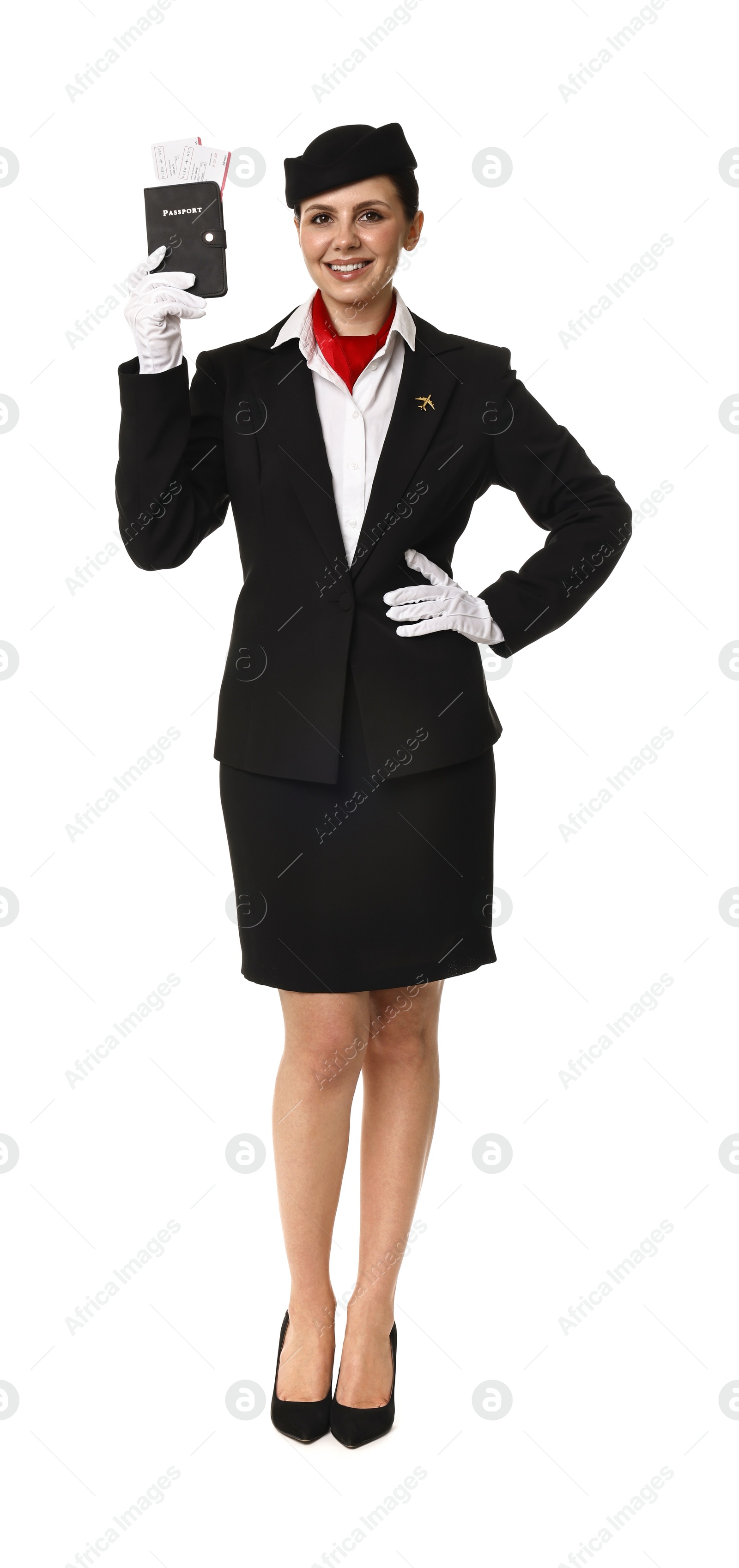 Photo of Happy stewardess holding passport with flight tickets on white background