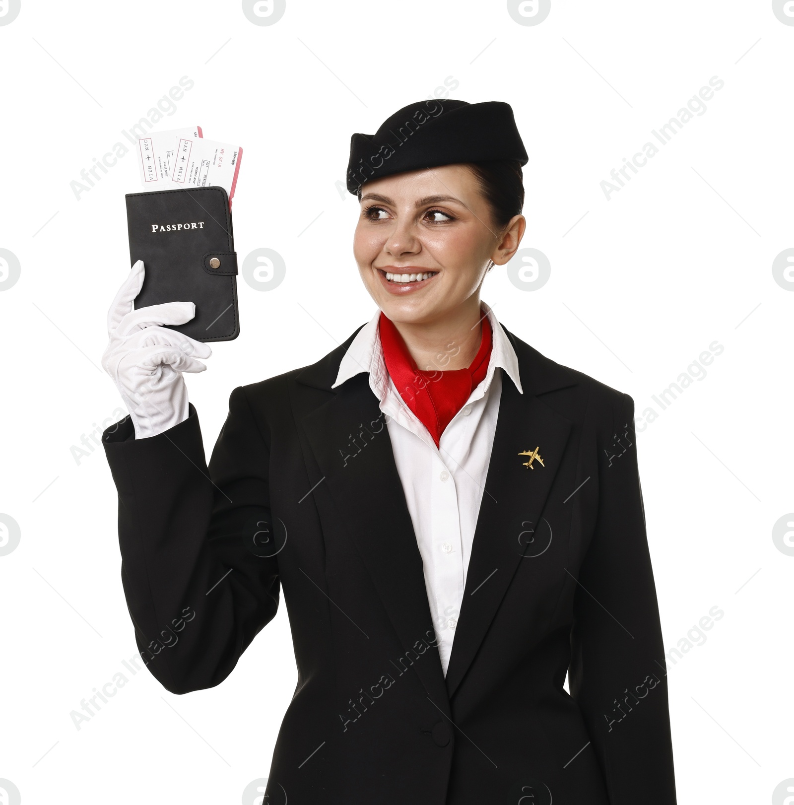 Photo of Happy stewardess holding passport with flight tickets on white background