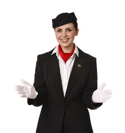 Smiling flight attendant demonstrating safety instruction on white background