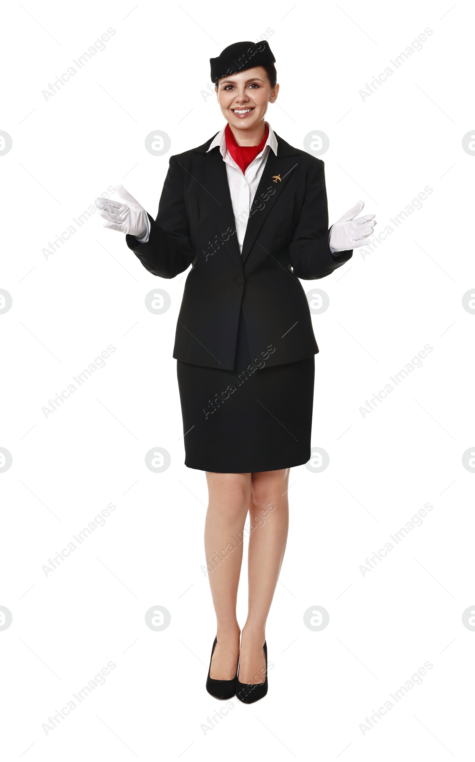 Photo of Smiling flight attendant demonstrating safety instruction on white background