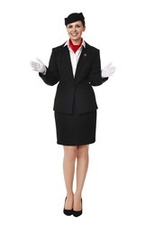 Smiling flight attendant demonstrating safety instruction on white background