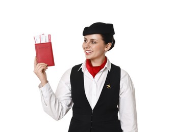 Happy stewardess holding passport with flight tickets on white background