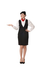 Photo of Smiling flight attendant showing something on white background