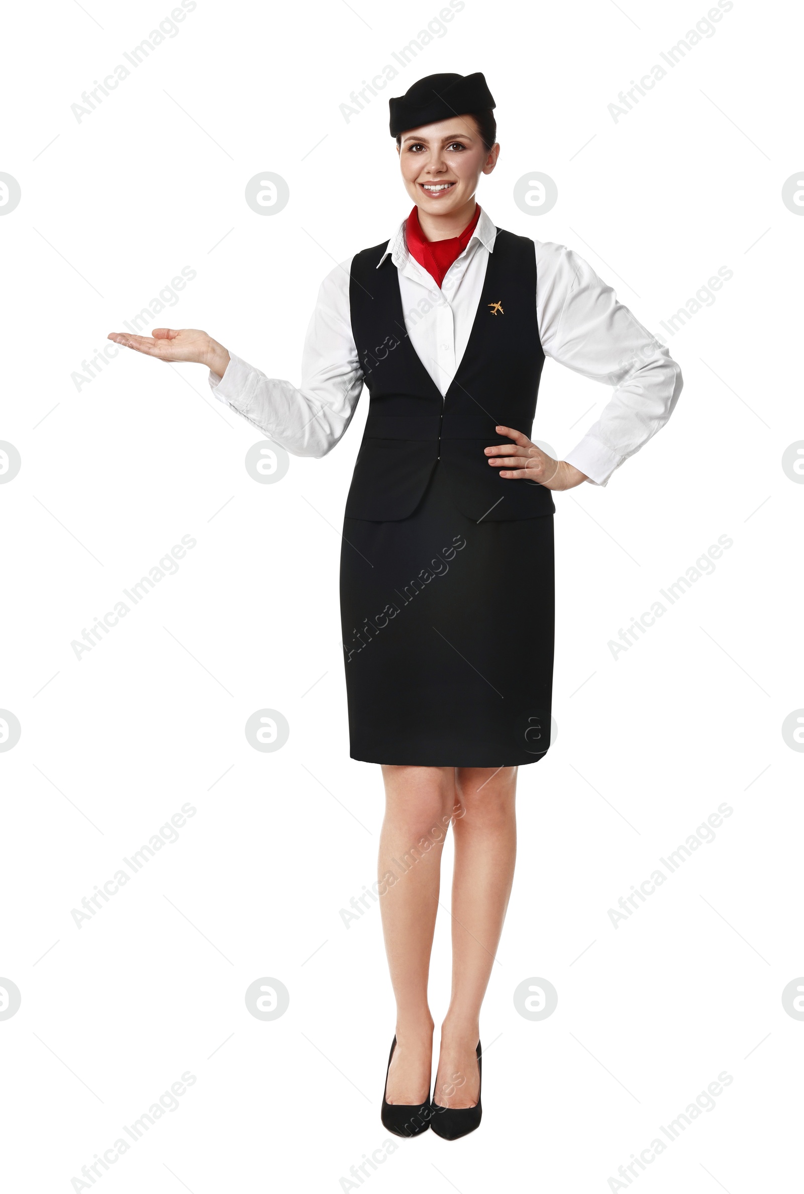 Photo of Smiling flight attendant showing something on white background