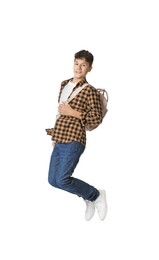 Photo of Teenage boy with backpack jumping on white background