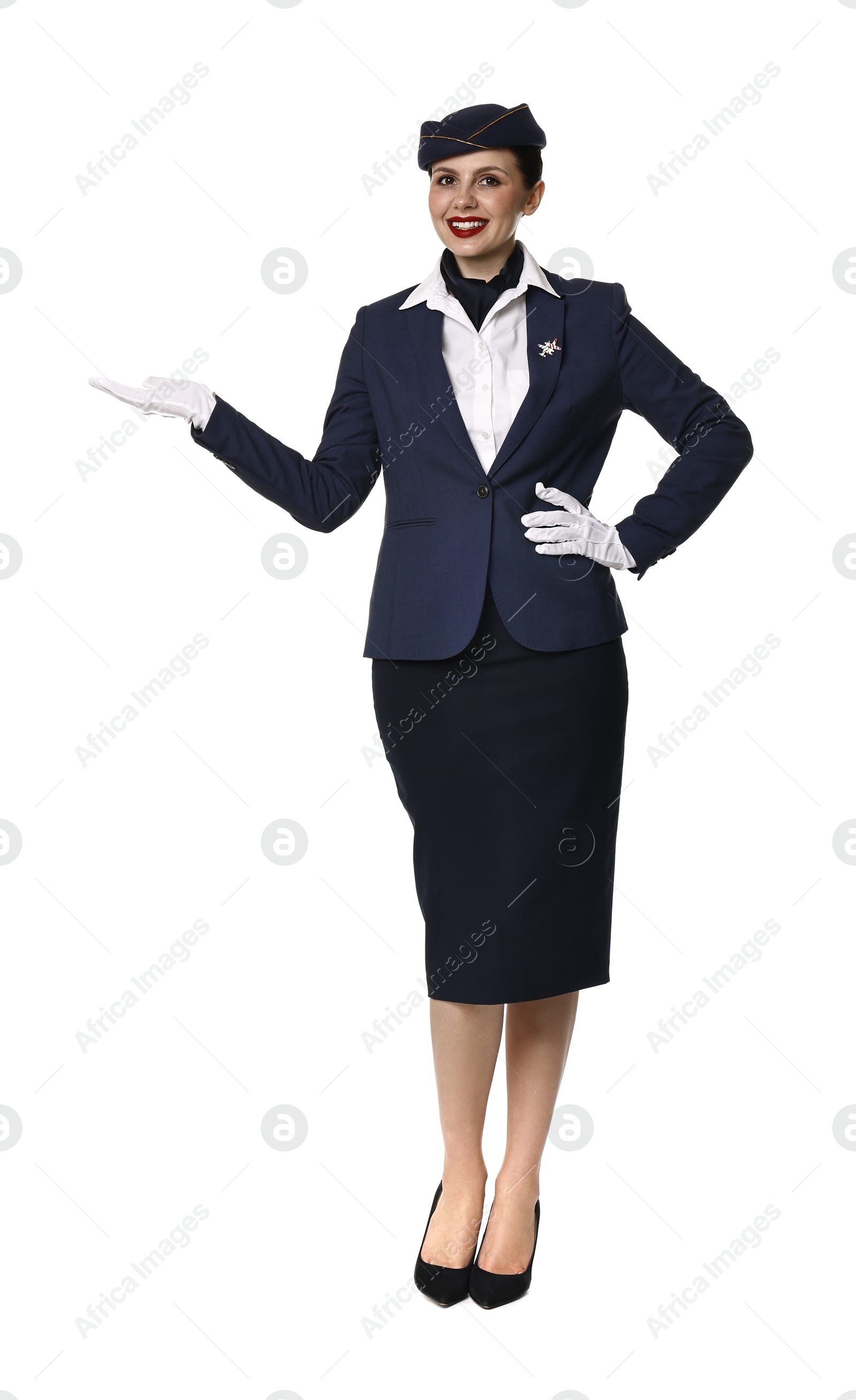 Photo of Smiling stewardess showing something on white background