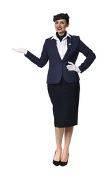 Photo of Smiling stewardess showing something on white background