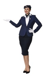 Photo of Smiling stewardess showing something on white background