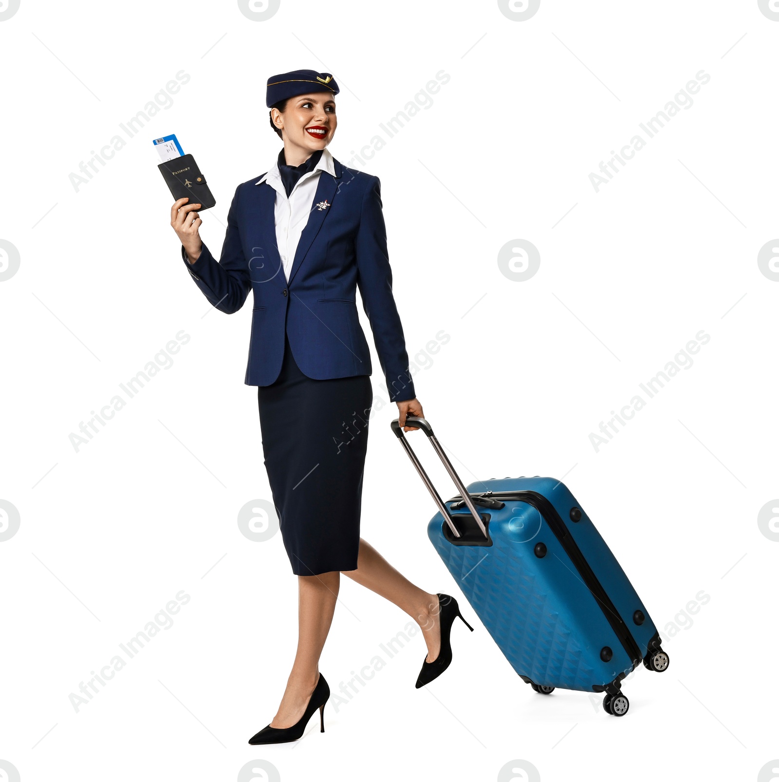 Photo of Happy stewardess with suitcase, passport and flight ticket on white background