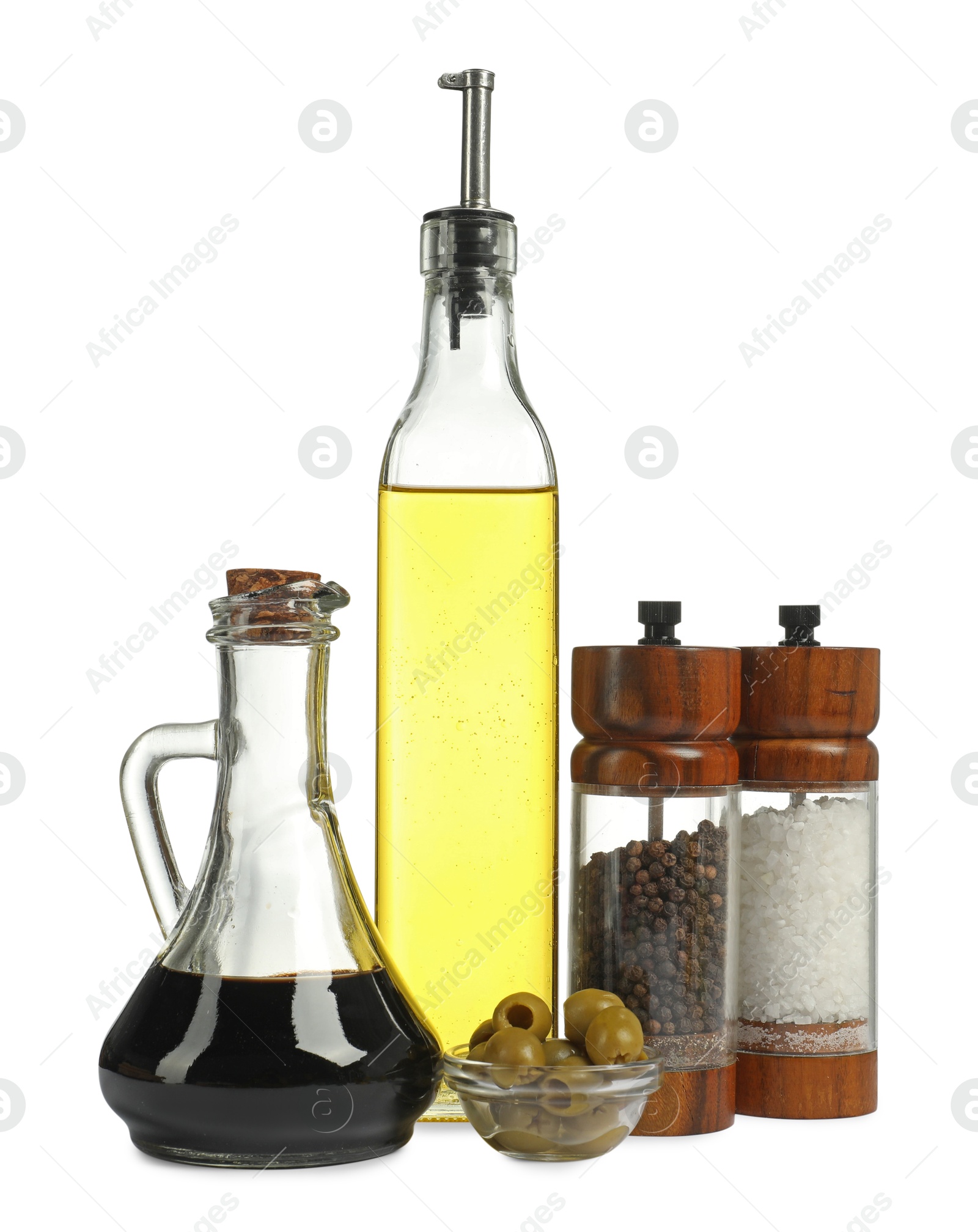 Photo of Salad dressings, spices and olives isolated on white