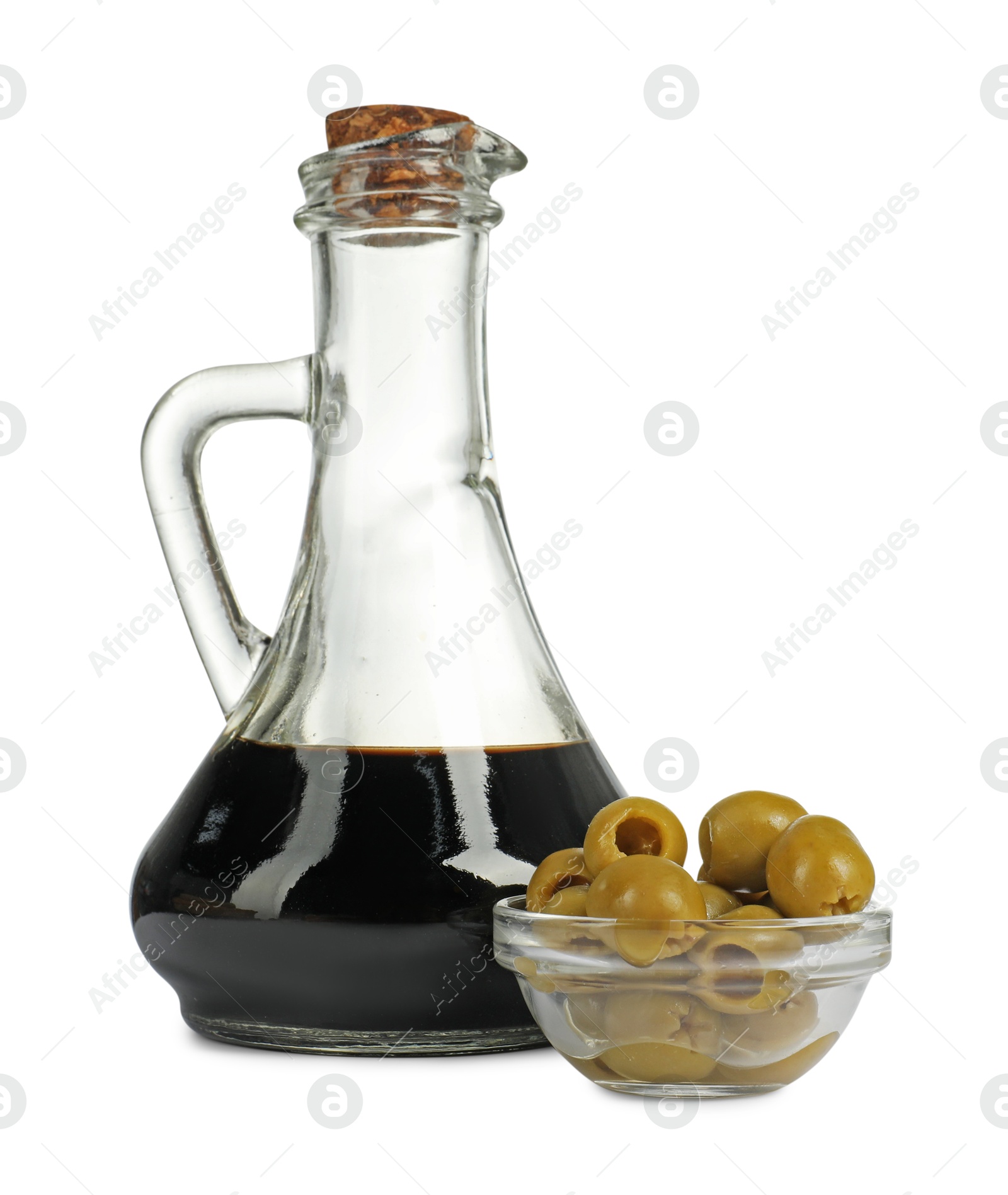 Photo of Balsamic vinegar and olives isolated on white