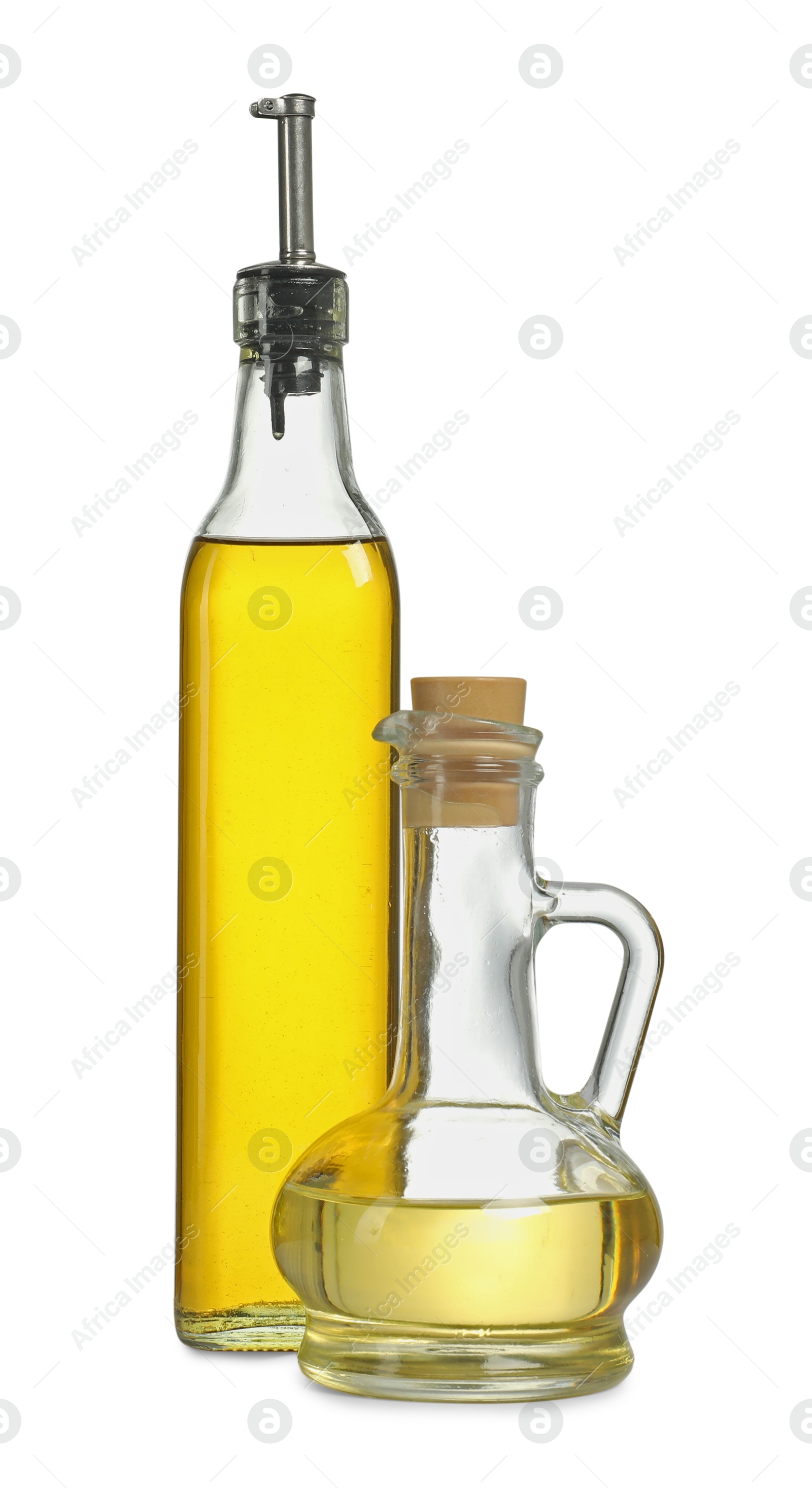 Photo of Oil and vinegar in bottles isolated on white