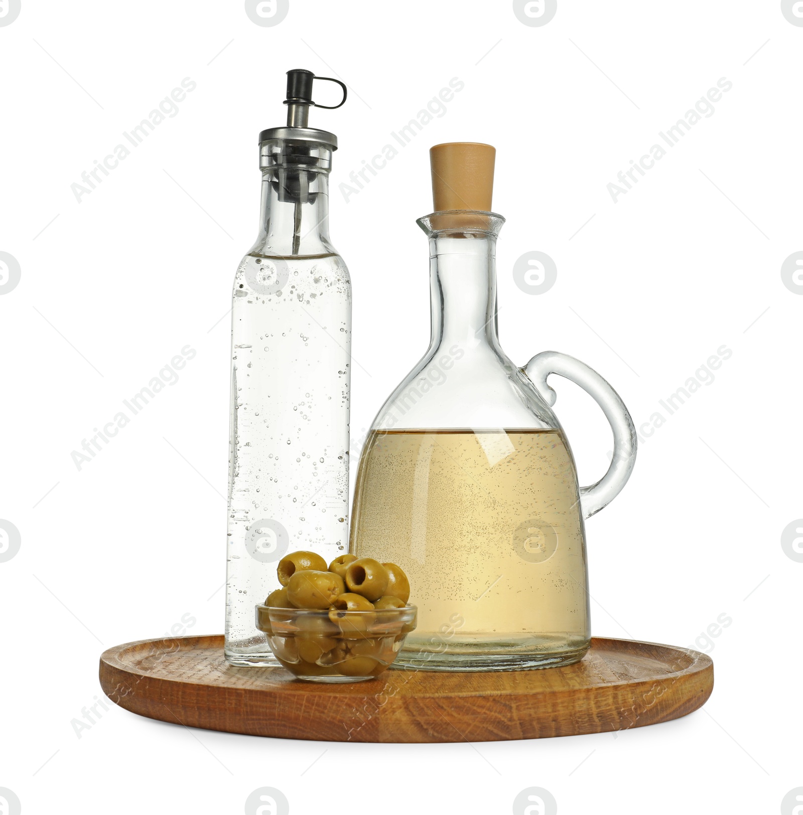 Photo of Salad dressings and olives isolated on white