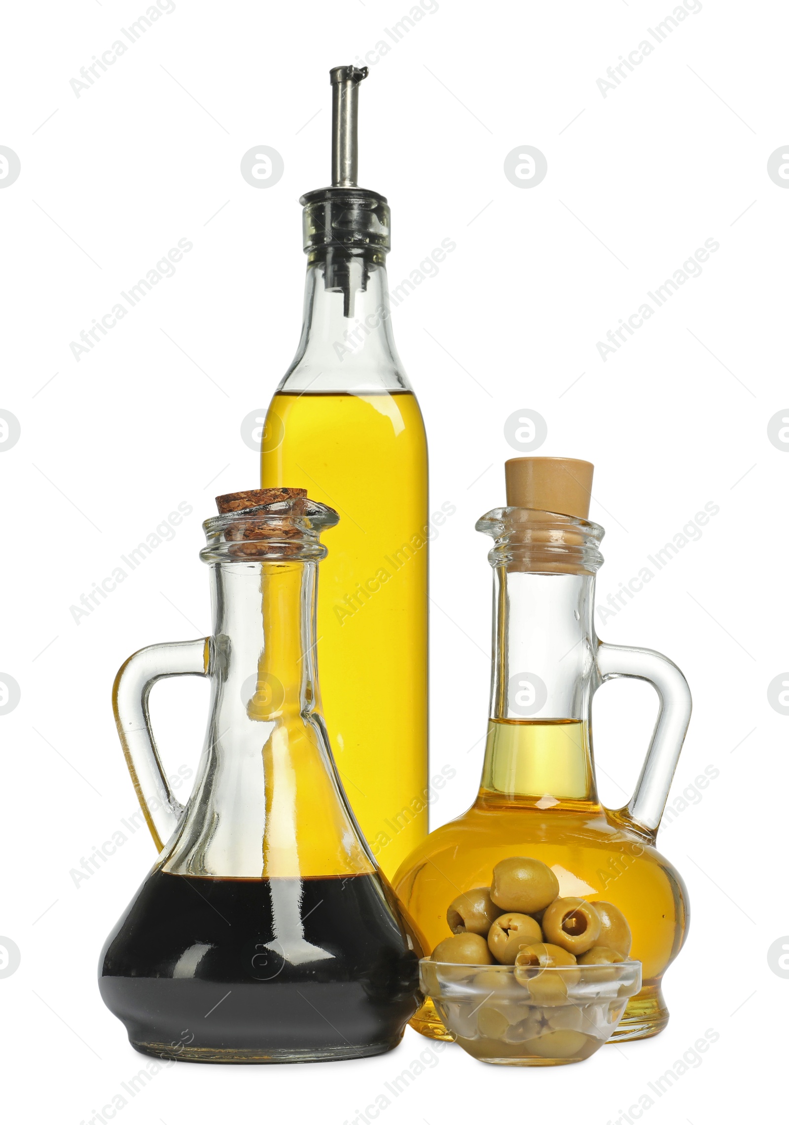 Photo of Salad dressings and olives isolated on white