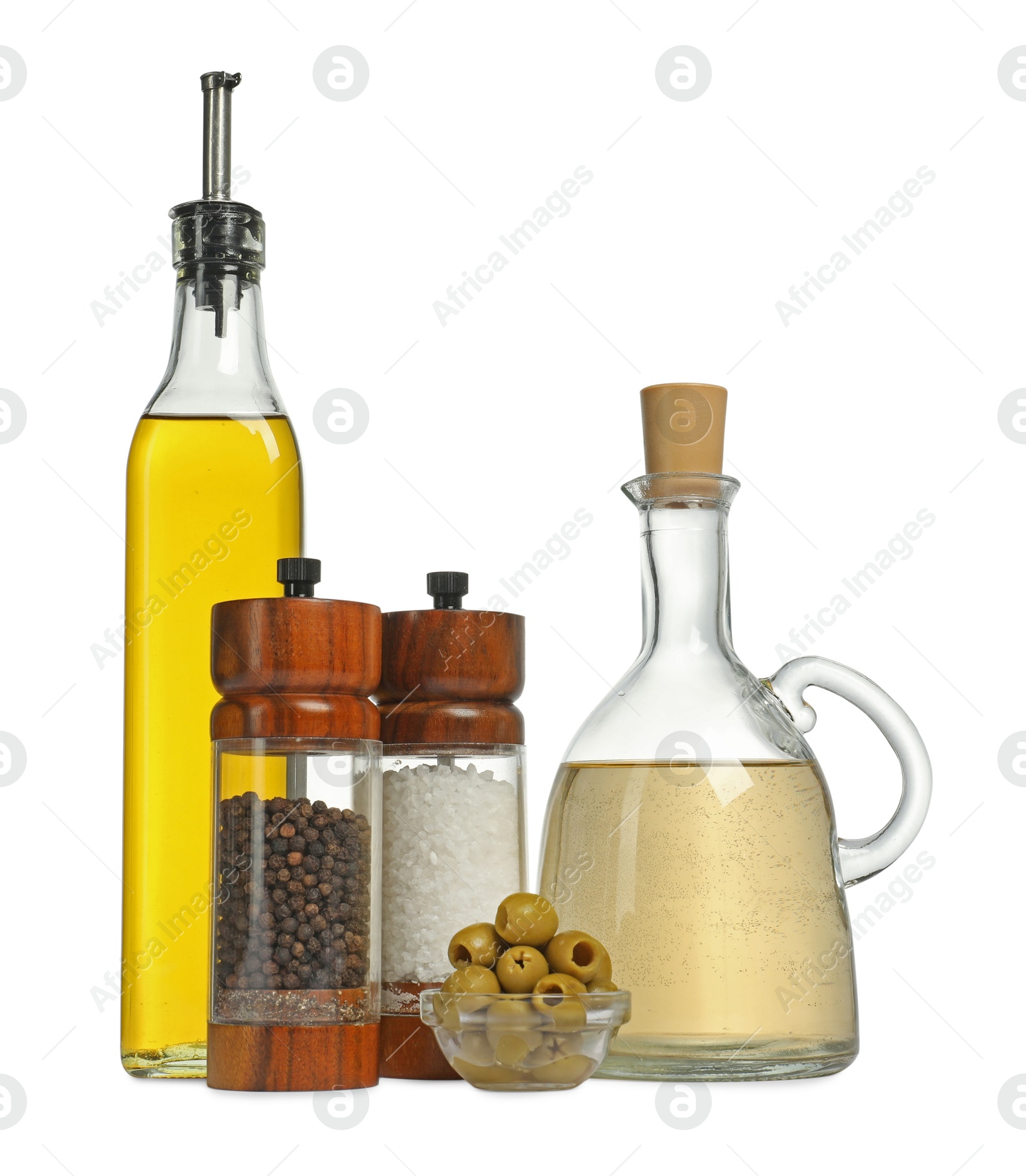 Photo of Salad dressings, spices and olives isolated on white