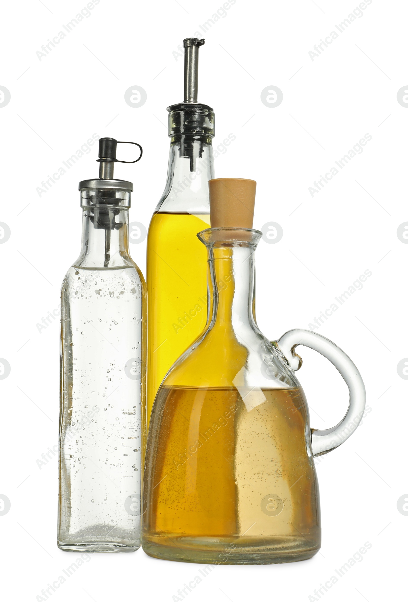 Photo of Oil and vinegar in bottles isolated on white