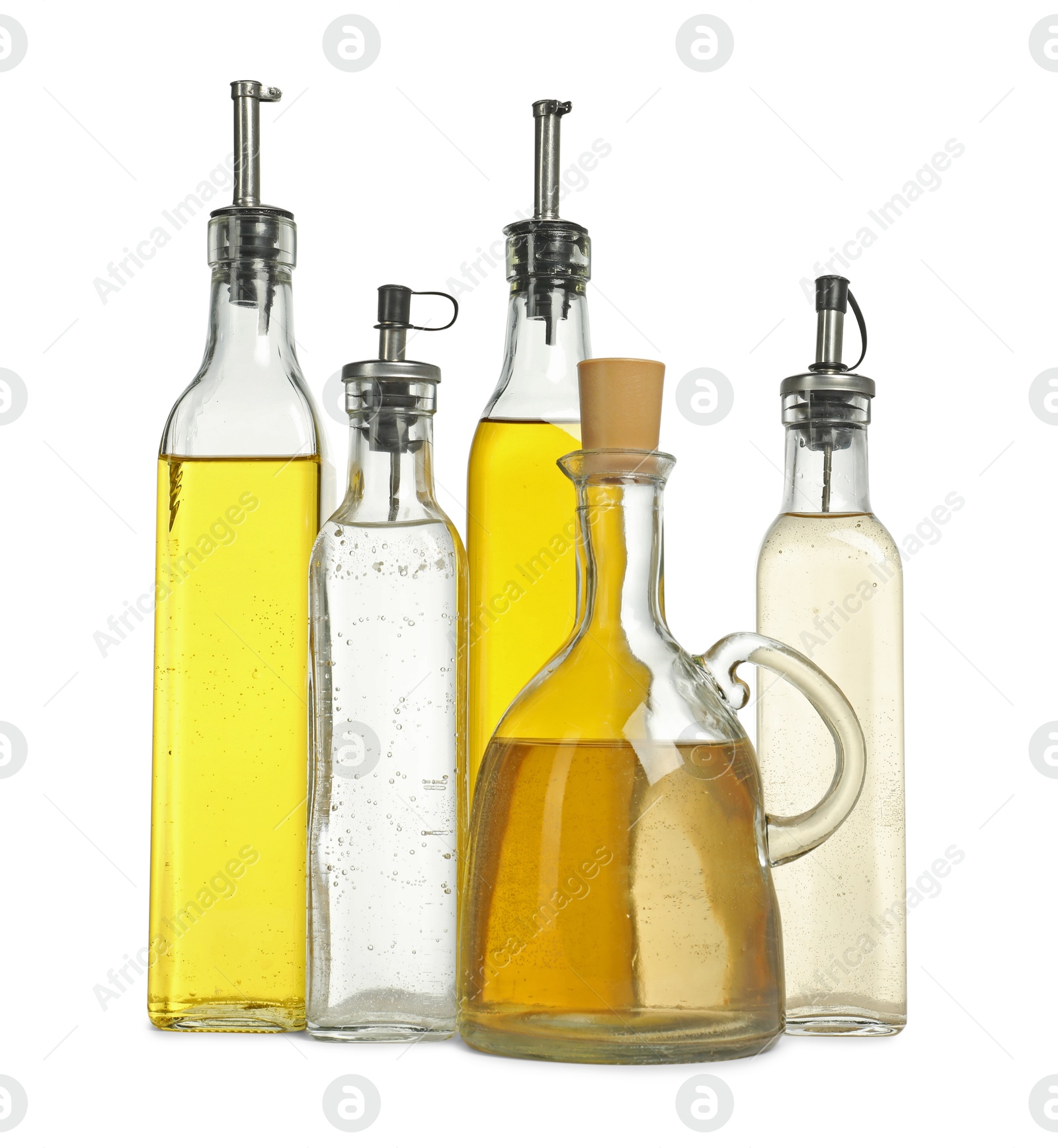 Photo of Oil and vinegar in bottles isolated on white