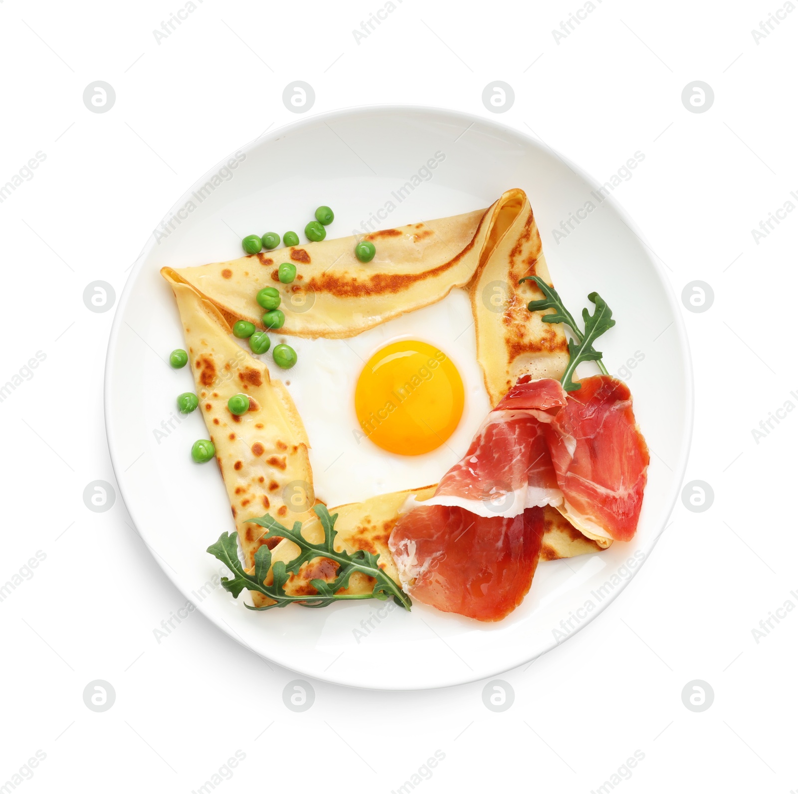 Photo of Delicious crepe with egg, bacon, green peas and arugula isolated on white, top view