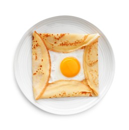 Photo of Delicious crepe with egg isolated on white, top view