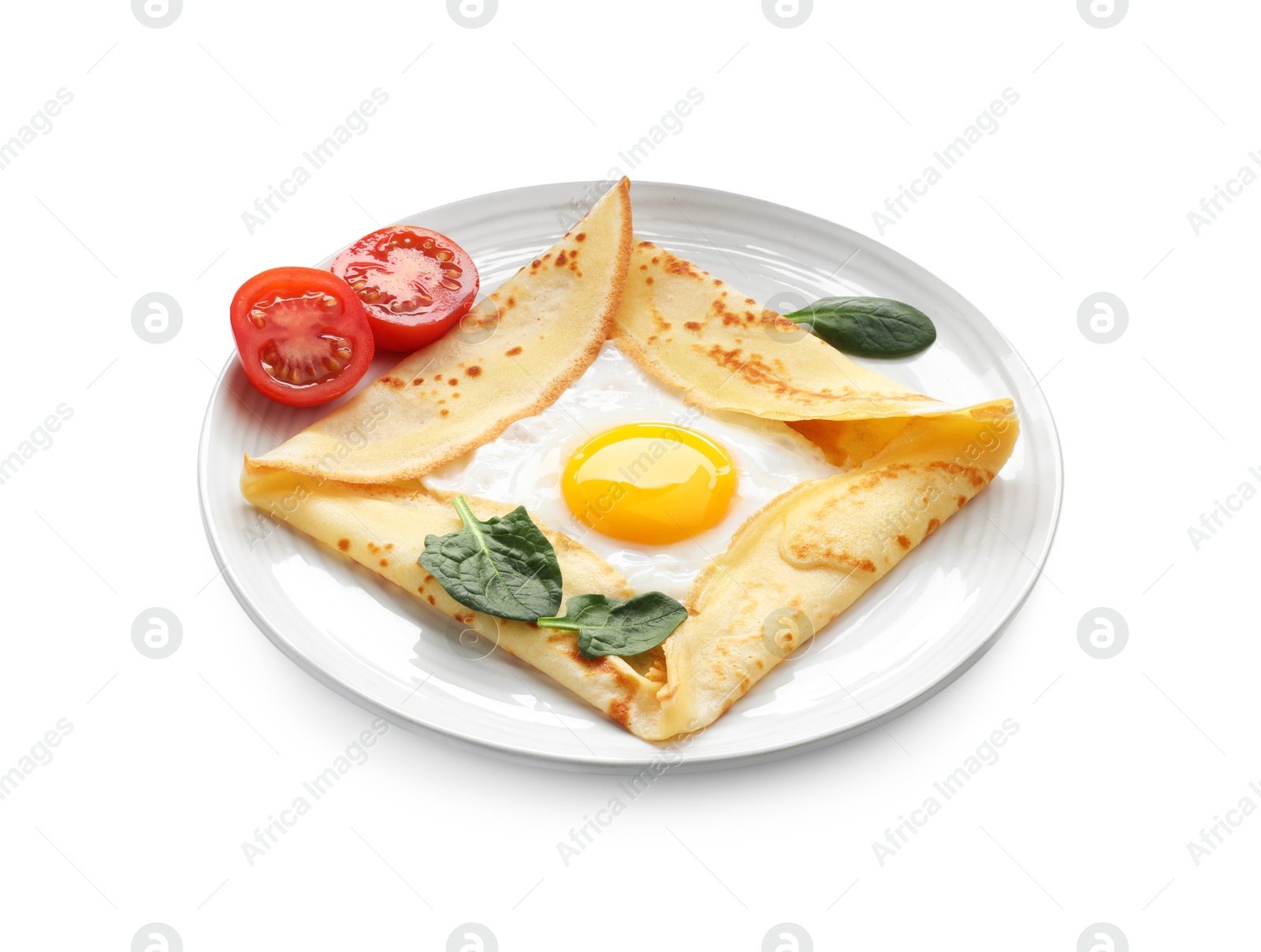 Photo of Delicious crepe with egg, tomato and basil isolated on white