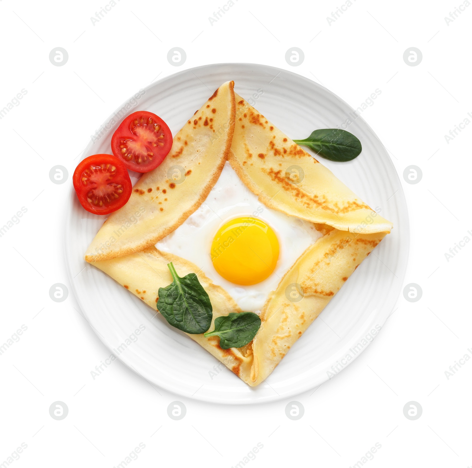 Photo of Delicious crepe with egg, tomato and basil isolated on white, top view