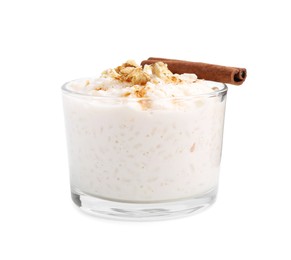 Photo of Tasty rice pudding with cinnamon and nuts in glass bowl isolated on white