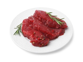 Photo of Pieces of raw beef meat and spices isolated on white