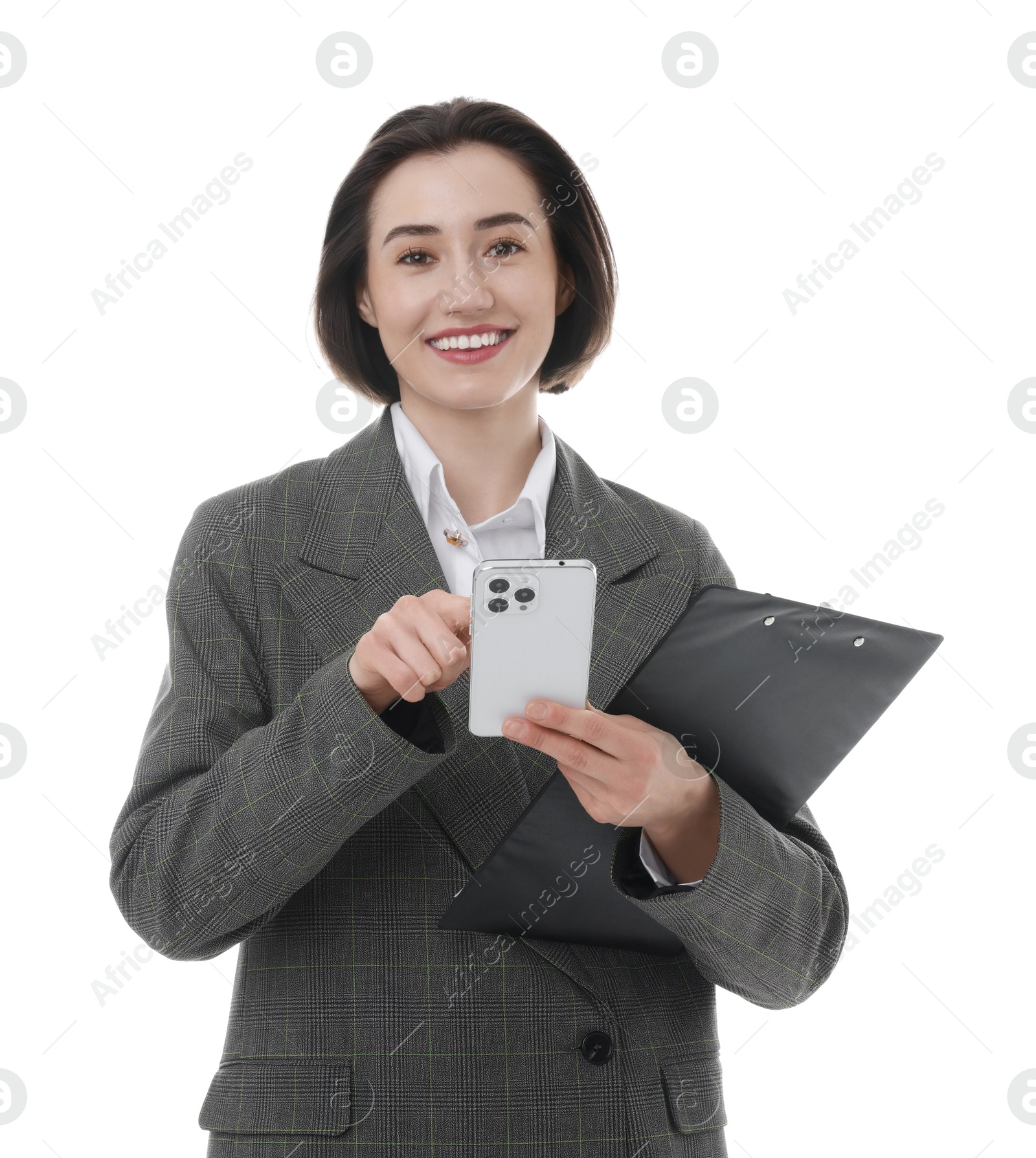 Photo of Smiling secretary with clipboard using smartphone on white background