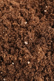 Photo of Texture of fresh soil as background, closeup