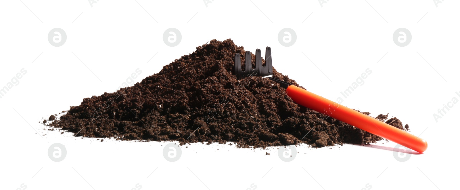 Photo of Pile of fresh soil and rake isolated on white