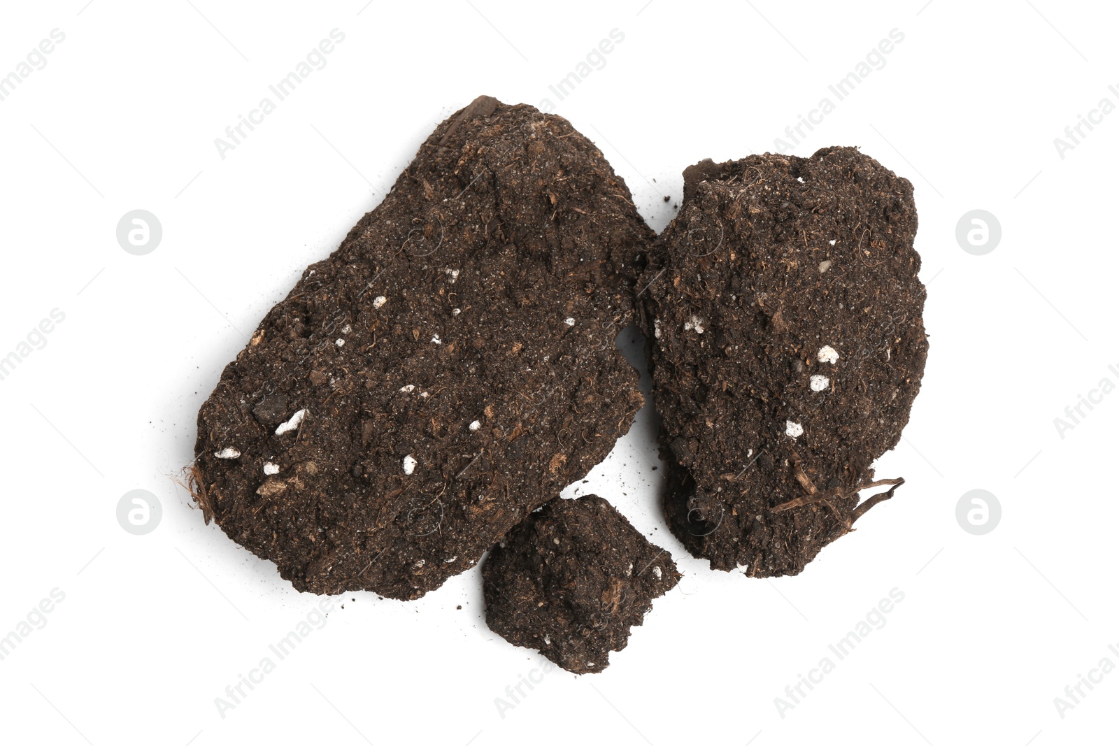 Photo of Piles of fresh soil isolated on white, top view