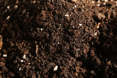 Photo of Texture of fresh soil as background, closeup