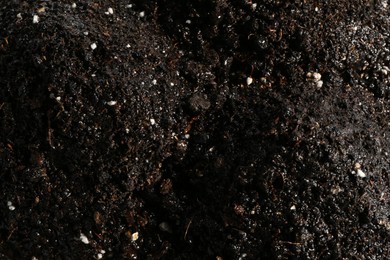 Photo of Texture of fresh soil as background, closeup