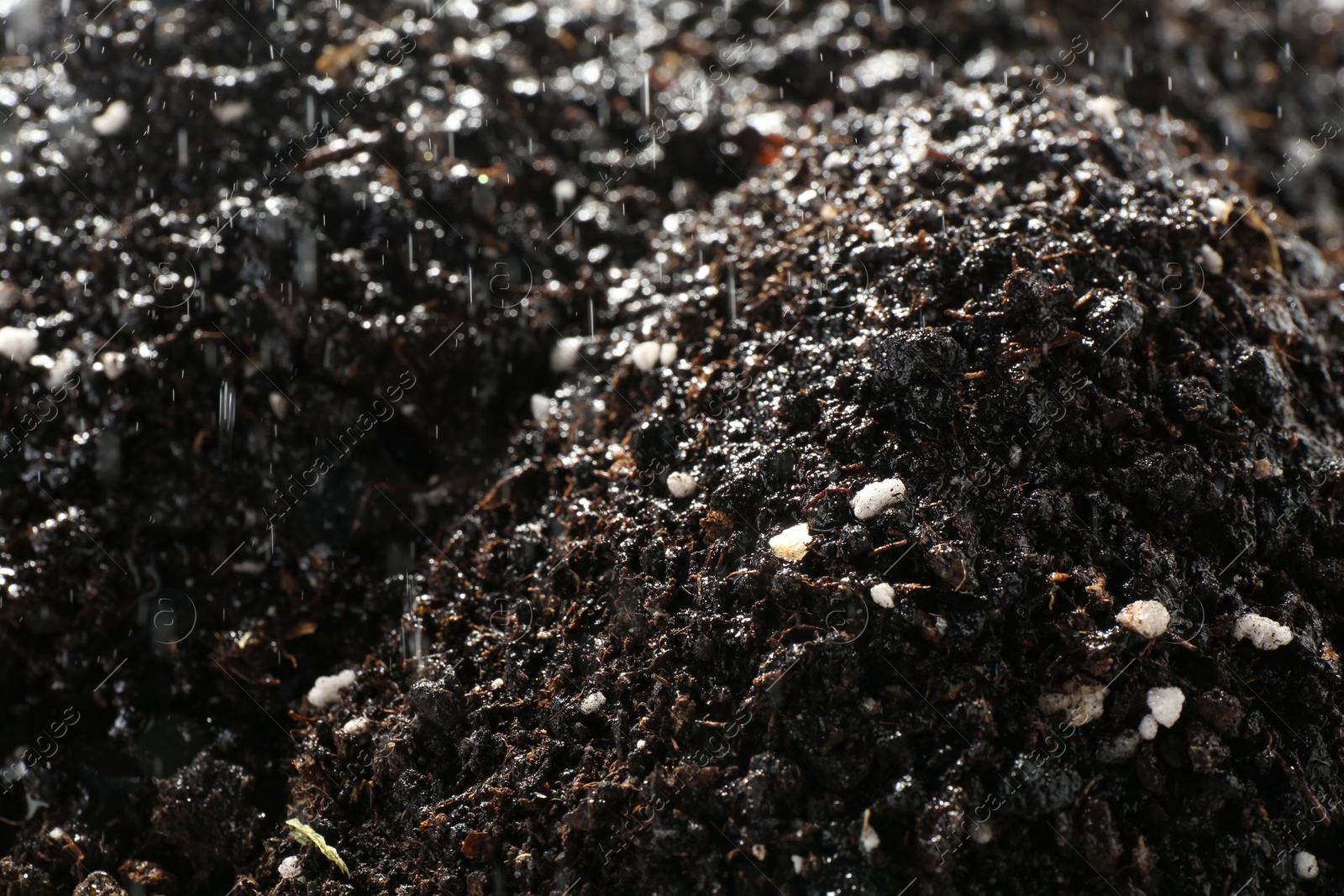 Photo of Texture of fresh soil as background, closeup