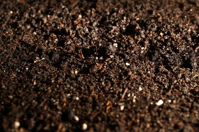 Photo of Texture of fresh soil as background, closeup