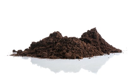 Photo of Piles of fresh soil isolated on white