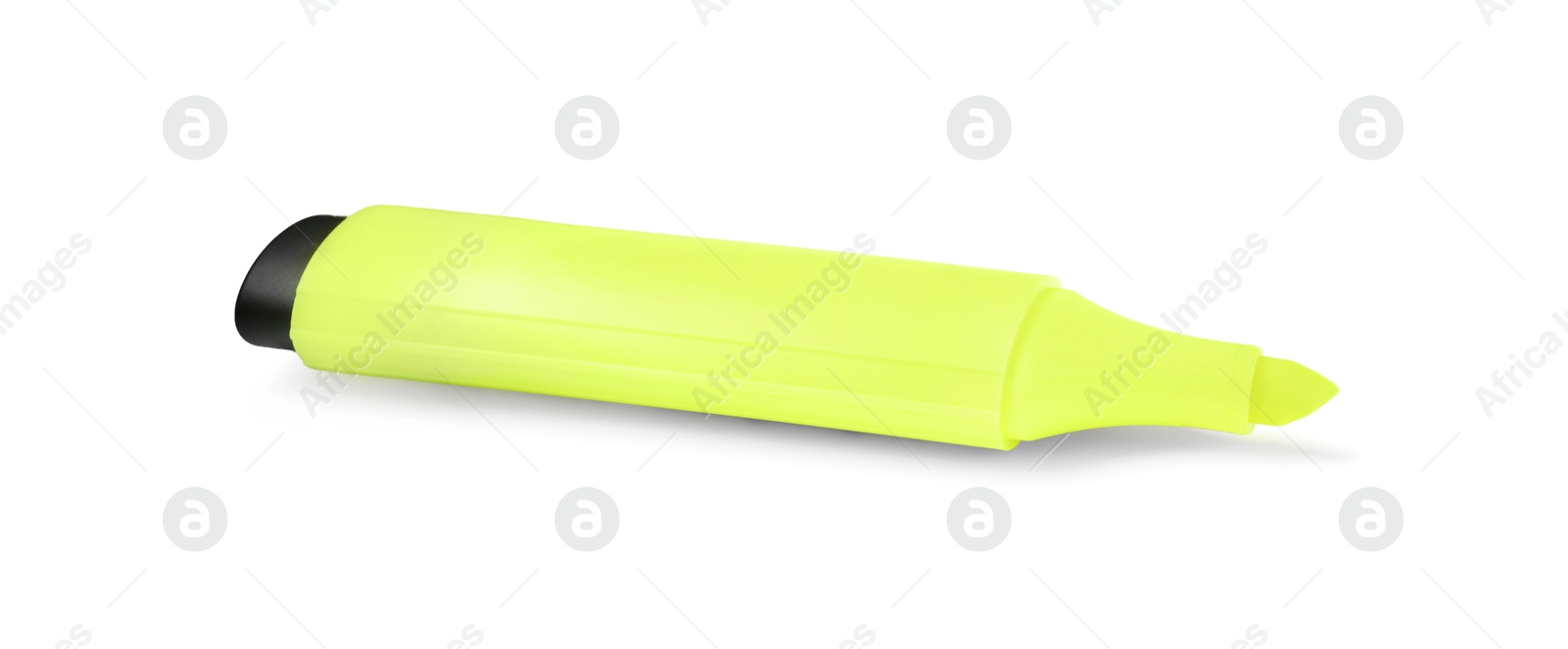 Photo of One bright highlighter isolated on white. School stationery